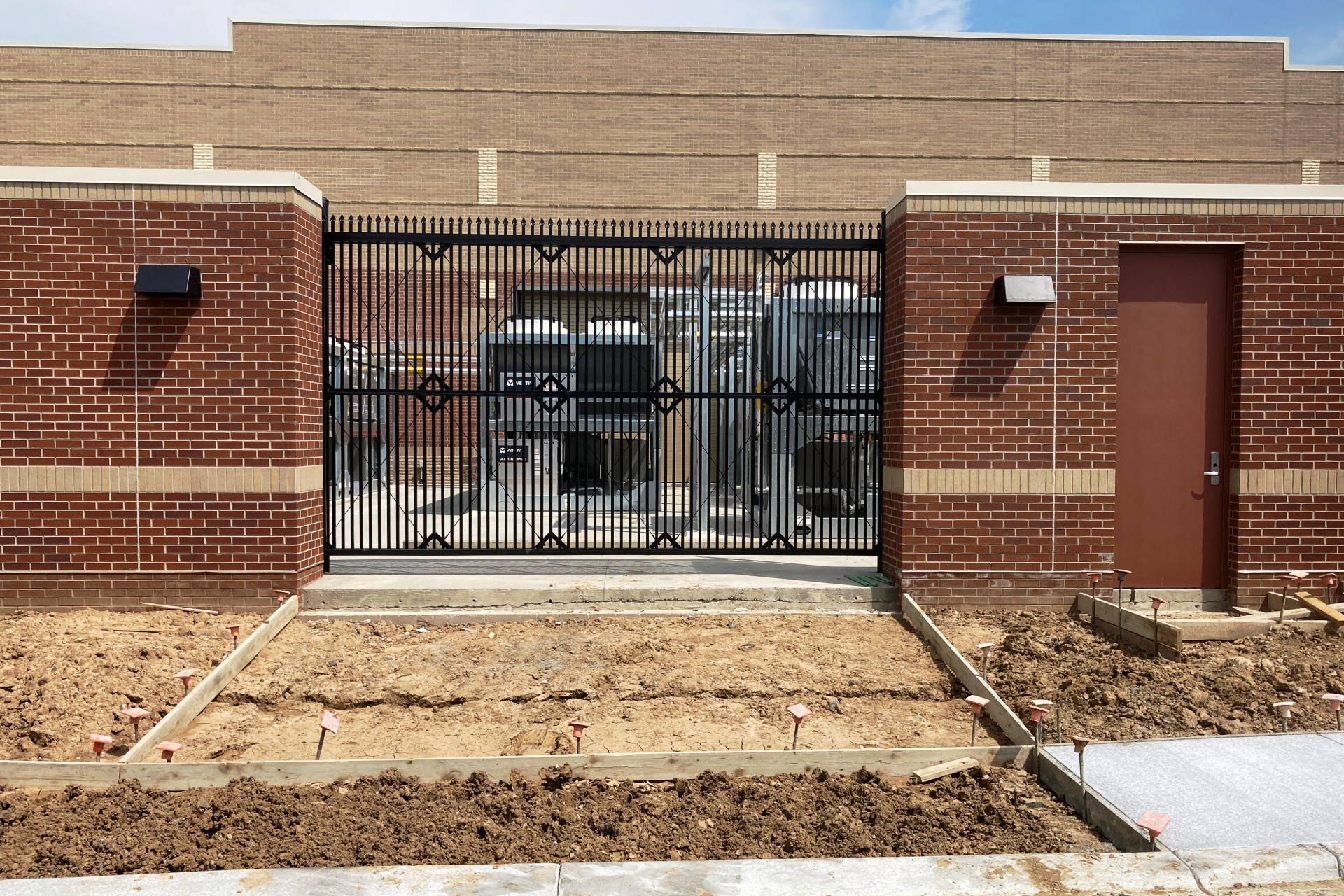 Service yard access gate
